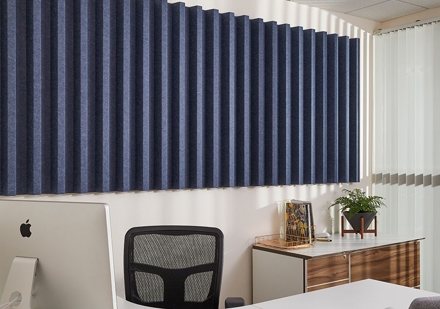 A stylish wall mounted acoustic panel in an office