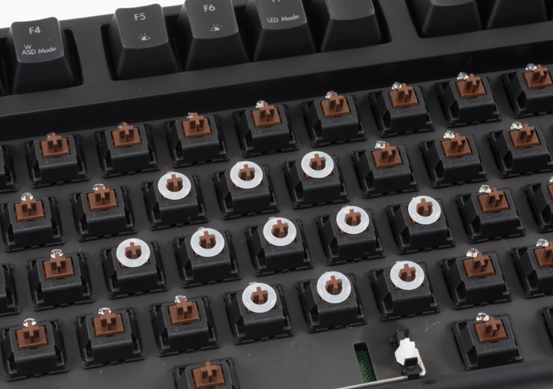 A few O-rings installed on a mechanical keyboard.